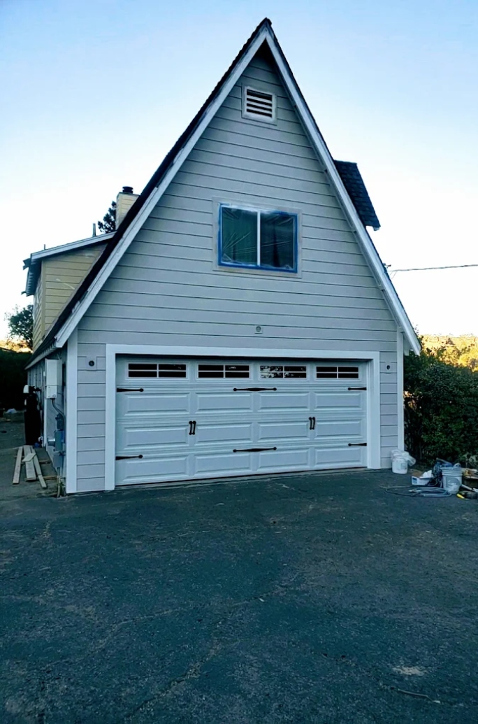 A garage door that won't close being professionally repaired